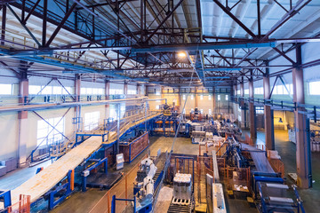 Naklejka premium Fiberglass production industry equipment at manufacture background