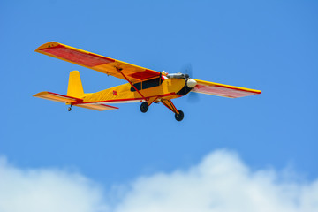 Homemade radio control aircraft  on blue sky.