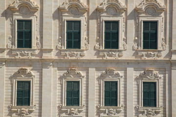 Fototapeta premium Green windows, old facade, architecture of Valletta, Malta
