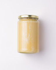 Simple Glass Honey Jar on White Background