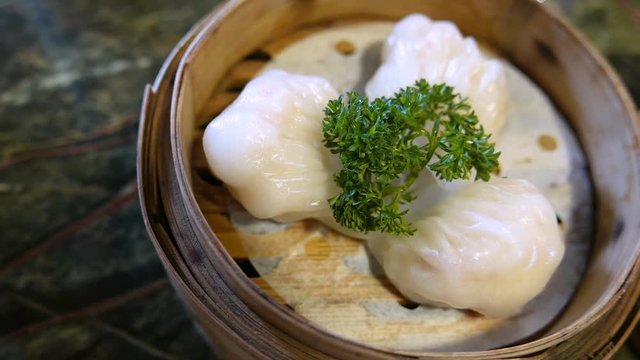 Ha gow a shrimp dumplings is a traditional Cantonese dumpling served in dim sum. 