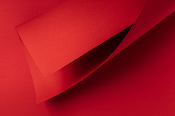close-up view of bright red abstract paper background