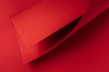 Obraz premium close-up view of bright red abstract paper background