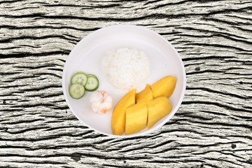 Thai treaditional food, Jasmine rice with vegetables and fruits as mangosteen, mango and cucumber.