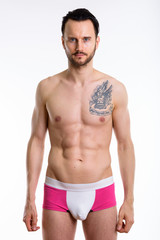 Fototapeta premium Young handsome bearded man shirtless