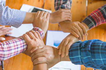 Obraz na płótnie Canvas Hands of success startup business teamwork. Creative idea teamwork concept. Group of multiethnic diverse team