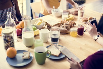 A group of diverse women having breakfast together
