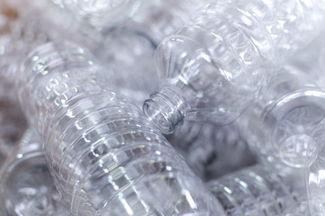 Bottle. Industrial production of plastic pet bottles. Factory line for manufacturing polyethylene bottles. Transparent food packaging.