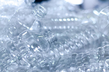 Bottle. Industrial production of plastic pet bottles. Factory line for manufacturing polyethylene bottles. Transparent food packaging.