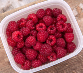 Basket full of red raspberries