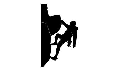 a silhouette picture of a man climbing a rock