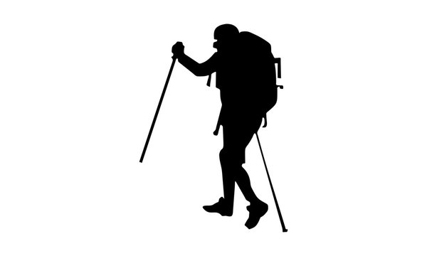 silhouette picture of a man traveling while climbing.