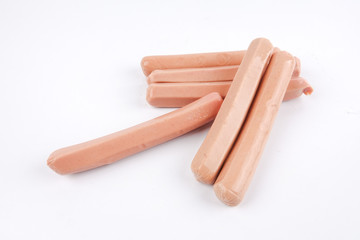 Raw meat sausages isolated on white background