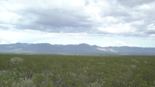 Wide Shot In Potosi Desert, Pan Left, Mountain in Background