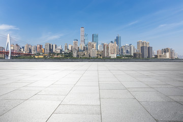 Panoramic skyline and buildings with empty concrete square floor，chongqing city，china