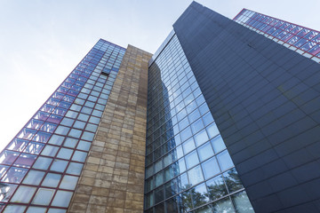 Obraz premium Bottom view of office building window close up