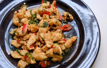 Spicy Chicken with basil and asian ingredient in Thai style