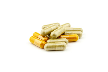 Herbal medicines capsules colourful pills in blister on white background , healthy eating for good life.