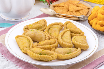 Gujiya or Gujia is a indian sweet dumpling made with suji, Maida or wheat flour and stuffed with khoya. It is common in North India, particularly in Bihar, Uttar Pradesh, Madhya Pradesh or Rajasthan