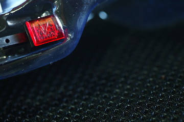 Turn signal indicator light of motorcycle model scene.