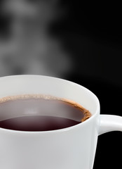 Coffee cup and beans isolated brown background