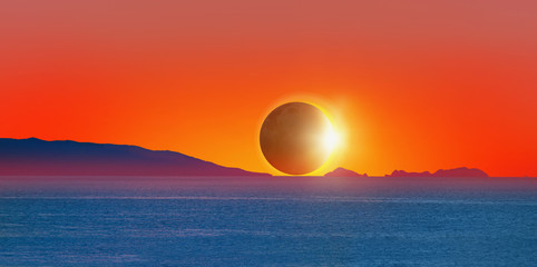 Beautiful landscape with Solar Eclipse - Beauty sunset over the sea "Elements of this image furnished by NASA "