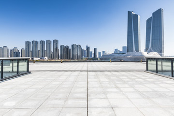 Panoramic skyline and buildings with empty concrete square floor，chongqing city，china