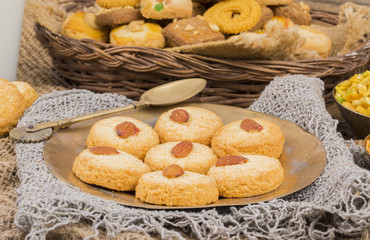 Healthy Homemade Sweet Almond Cookies or biscuits Also Know as Nan Khatai on vintage background
