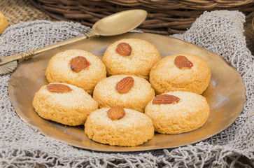 Healthy Homemade Sweet Almond Cookies or biscuits Also Know as Nan Khatai on vintage background