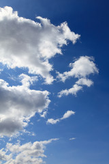 Clouds on a blue sky as a background