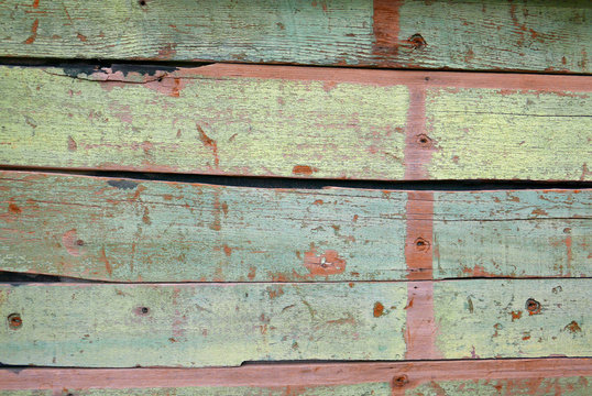 Closeup of wooden wall painted light green