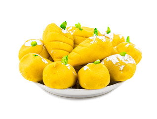 Indian Sweet Food Mango Mawa Pedha or Peda isolated on White Background