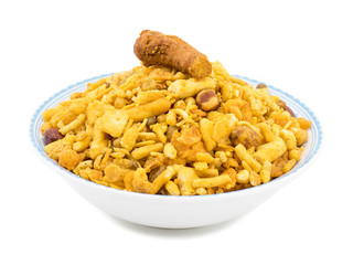Indian Delicious And Crunchy Mix Namkeen Food Also Know As Mixture, Chivda, Farsan, Namkin, Nimco or Nimko Made of Gram Flour And Mixed With Dry Fruits isolated on White Background