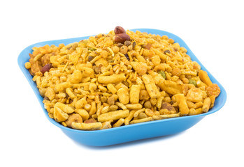 Indian Delicious And Crunchy Mix Namkeen Food Also Know As Mixture, Chivda, Farsan, Namkin, Nimco or Nimko Made of Gram Flour And Mixed With Dry Fruits isolated on White Background