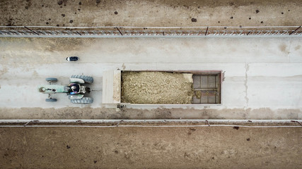 Farmer on a Tractor with dog working