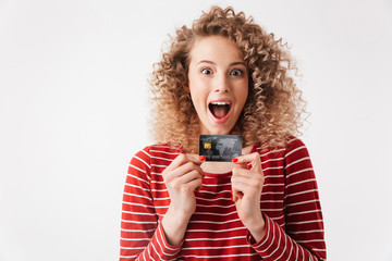 Close up portrait of cheerful young girl with curly hair