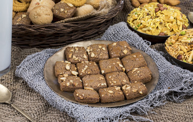 Special Traditional Fresh And Sweet Baked Chocolate Chip Cookies or Biscuits and Nan Khatai Served in Plate on Vintage Background