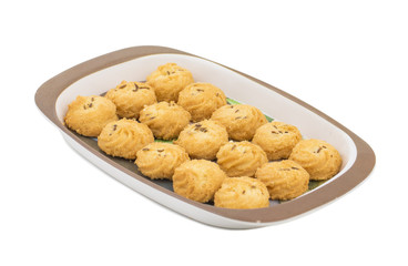 Salted Flavor Small Cumin Cookies or Biscuits Also Know as Nan Khatai or Jeera Cookies is a tea time Snack. Little Sweet and Little Salty isolated on White Background