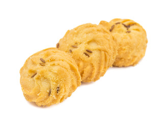 Salted Flavor Small Cumin Cookies or Biscuits Also Know as Nan Khatai or Jeera Cookies is a tea time Snack. Little Sweet and Little Salty isolated on White Background