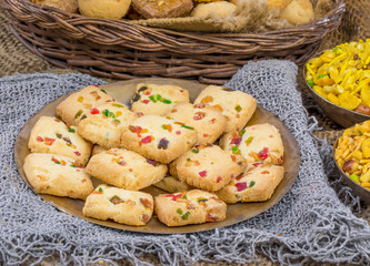 Obraz na płótnie Canvas Delicious Tutti Frutti Cookies or Biscuits Also Know as Candied Fruits Cookies on Vintage Background