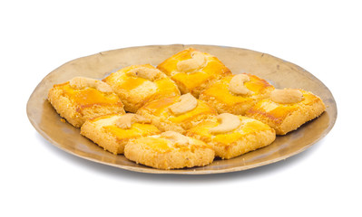 Special Freshly Sweet Cashew Nut Cookies or Biscuits Served in Plate Also Know as in India Nan Khatai, Kaju Cookies or Kaju Biscuits isolated on White Background