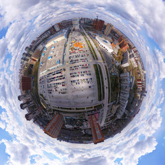 Helicopter drone shot. Aerial photography of a modern city over an area, a large crossroads,...