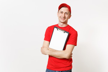Delivery man in red uniform isolated on white background. Male in cap, t-shirt, jeans working as courier or dealer, holding pen, clipboard with papers document, with blank empty sheet. Copy space.