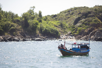 Fototapeta na wymiar ancient boats, fishermen's boats in Vietnam, fishing at sea, fishing