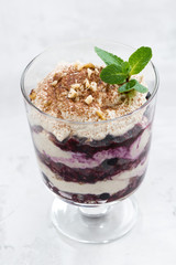 layered dessert with blueberries and cream, top view