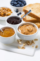 peanut butter, jams and toasts for breakfast, vertical