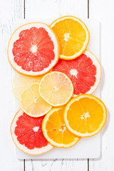 Slices of fresh citrus, vertical