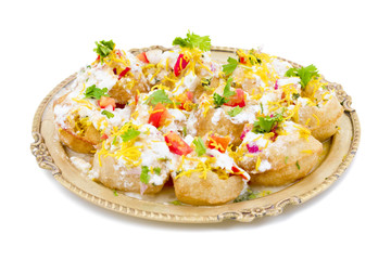 Indian Sweet And Spicy Chaat item Dahi Puri Also Called Dahi Batata Puri, Golgappe, Dahi Bhalle, Gol Gappa or Dahipuri Stuffed With Potato, Yogurt, Sev, Coriander, Chutney isolated on White Background