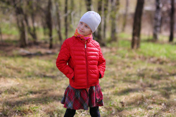 Portrait of a cute girl on a sunny spring day