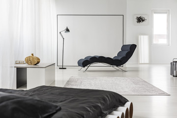 Spacious bedroom with chaise lounge